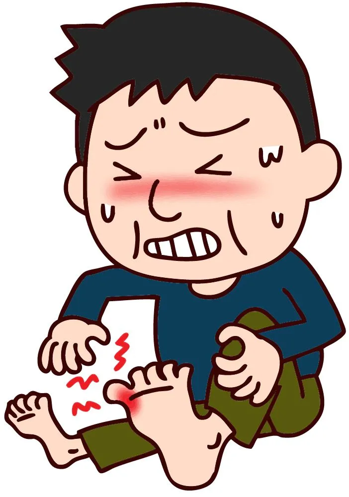 痛風で左足の親指が赤く腫れ、激痛に耐える男性のイラスト。足を押さえた手元にビリビリした痛みの線が描かれている。