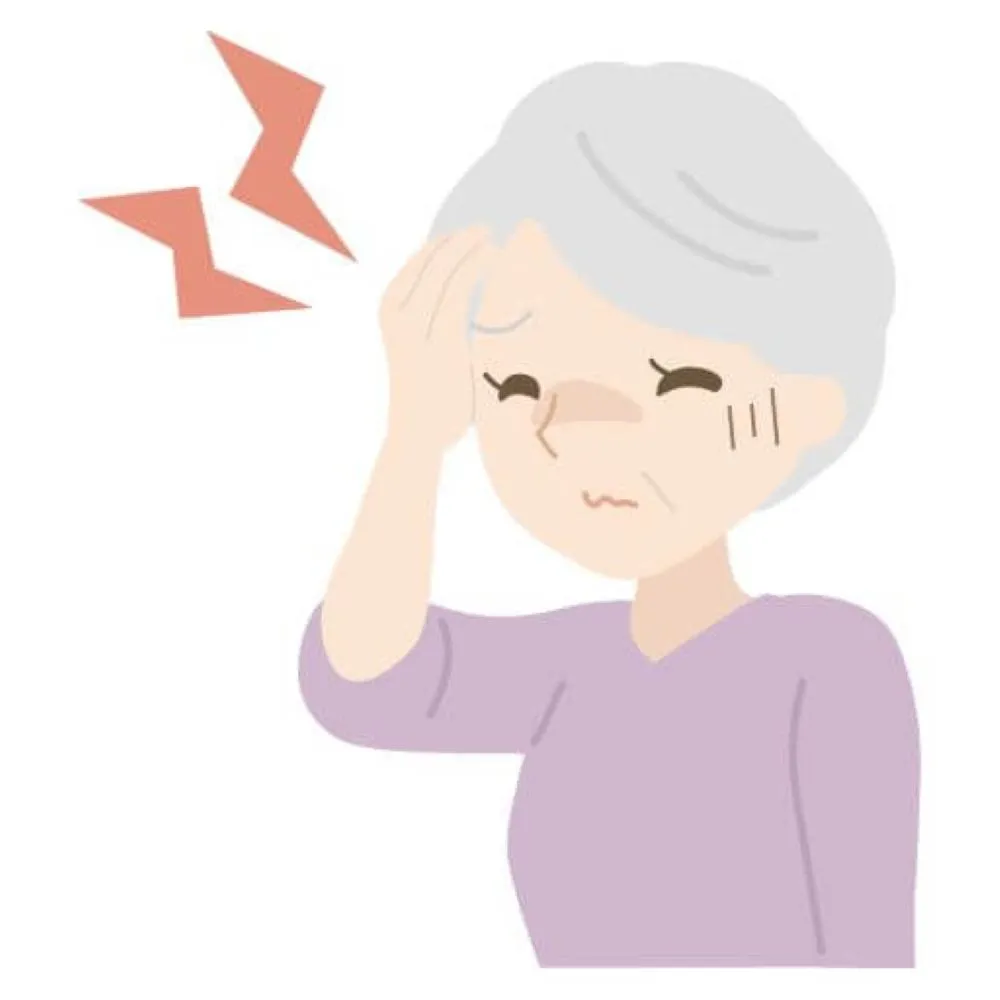 目を閉じて頭を押さえる高齢女性と、電撃のイラストで表現された強烈な頭痛のイメージ