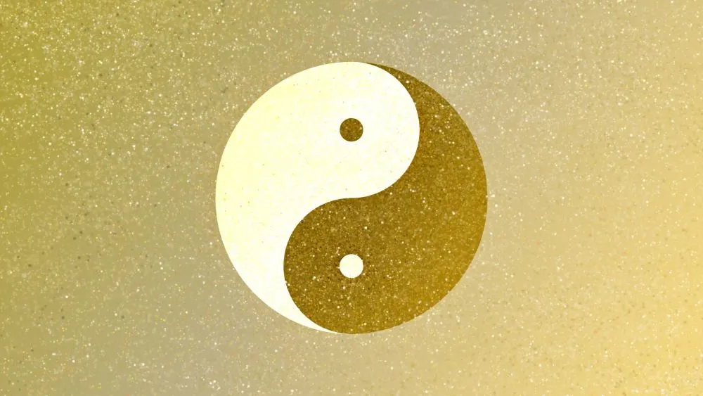 黄金色の太極図(陰陽図)。鍼灸の陰陽バランス理論を象徴する高級感あふれるデザイン。