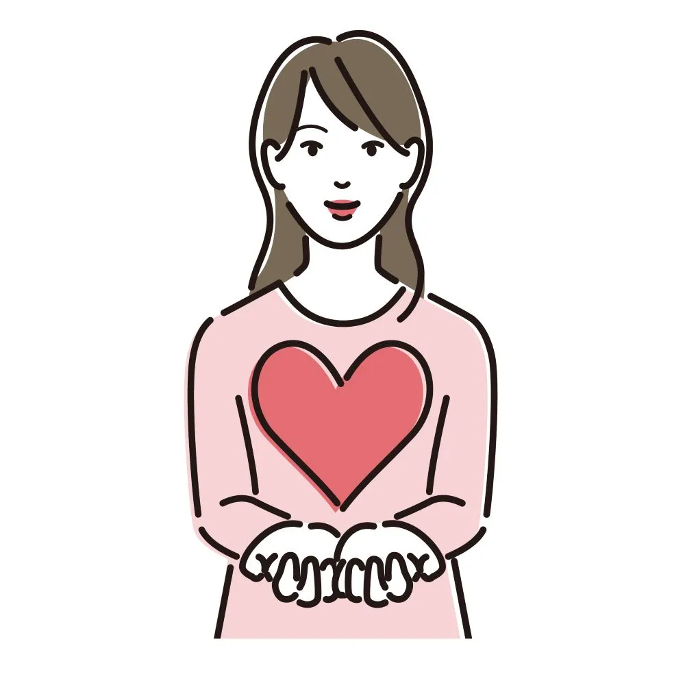 ピンクの服の女性がハートを持つ画像